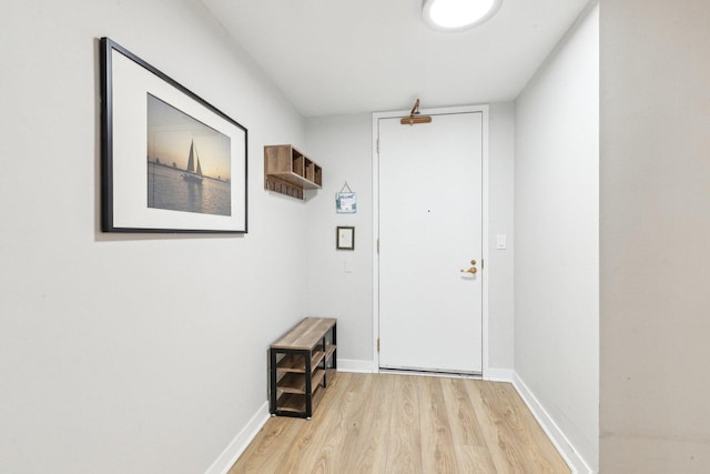 400 E Randolph St Unit 2424, Chicago, IL 60601 - entryway with baseboards and wood finished floors
