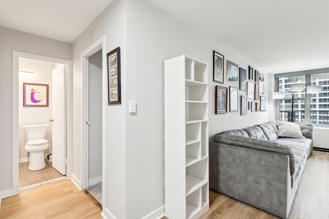 400 E Randolph St Unit 2424, Chicago, IL 60601 - hall featuring baseboards and light wood-style flooring