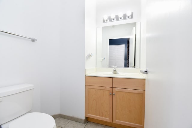 1101 S State St Unit 2100, Chicago, IL 60605 - half bathroom featuring tile patterned floors, vanity, and toilet