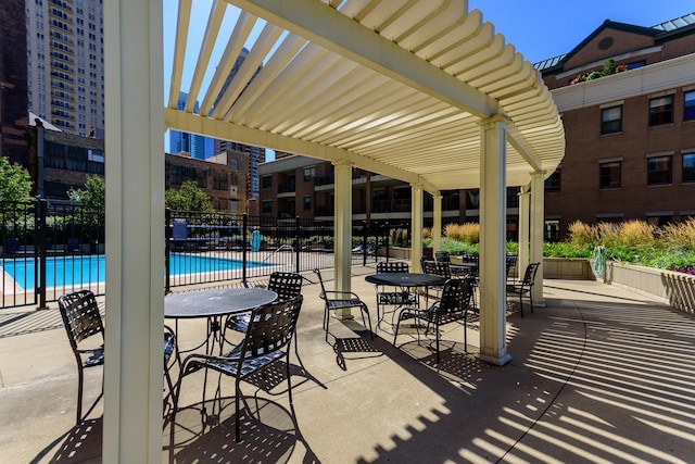 1101 S State St Unit 2100, Chicago, IL 60605 - view of patio / terrace featuring a community pool and fence