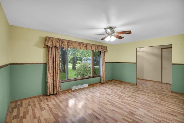 1106 Riverside Ct, Mahomet, IL 61853 - spare room with wood finished floors and ceiling fan
