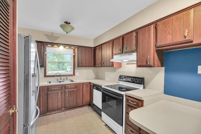 1106 Riverside Ct, Mahomet, IL 61853 - kitchen featuring white appliances, under cabinet range hood, light countertops, tasteful backsplash, and light flooring