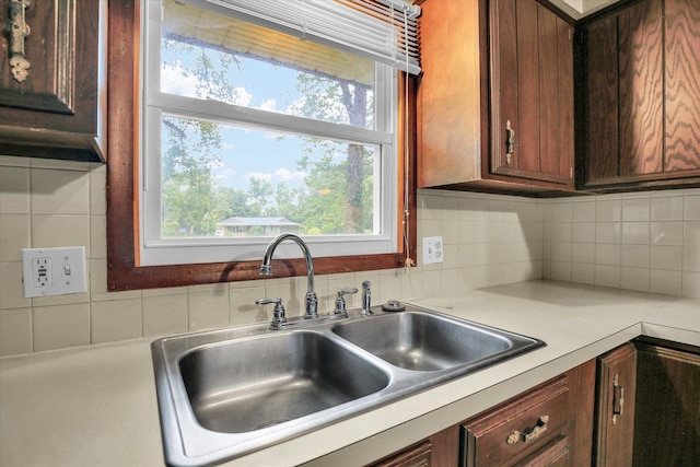 1106 Riverside Ct, Mahomet, IL 61853 - kitchen featuring light countertops and decorative backsplash