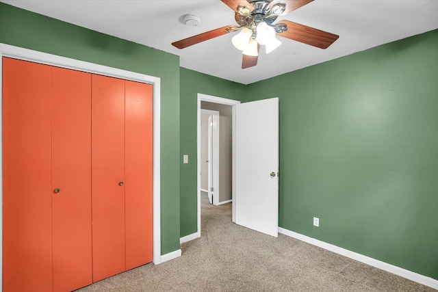 1106 Riverside Ct, Mahomet, IL 61853 - unfurnished bedroom featuring light colored carpet, a closet, and a ceiling fan