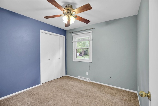 1106 Riverside Ct, Mahomet, IL 61853 - unfurnished bedroom featuring carpet flooring, a closet, and a ceiling fan