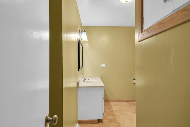 1106 Riverside Ct, Mahomet, IL 61853 - bathroom featuring vanity and baseboards