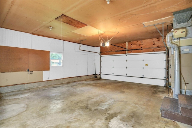 1106 Riverside Ct, Mahomet, IL 61853 - garage featuring a garage door opener