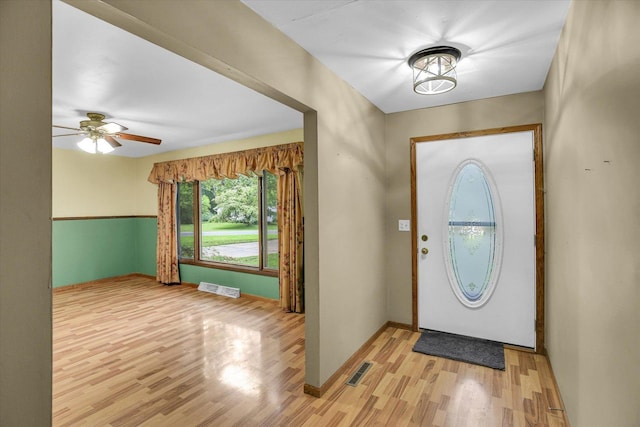 1106 Riverside Ct, Mahomet, IL 61853 - foyer featuring light wood-style flooring and a ceiling fan