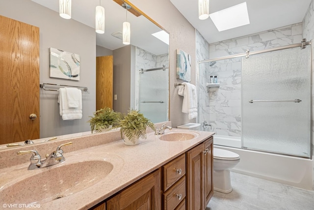 965 Sycamore Ct, Hoffman Estates, IL 60192 - full bathroom with a skylight, enclosed tub / shower combo, toilet, and double vanity
