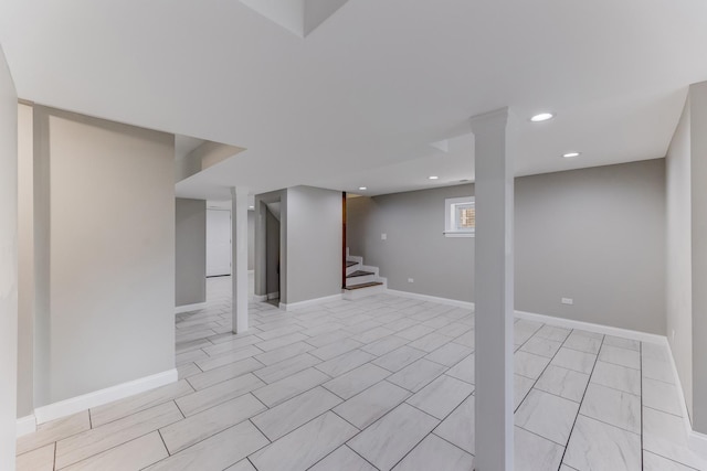 basement featuring stairs, recessed lighting, and baseboards