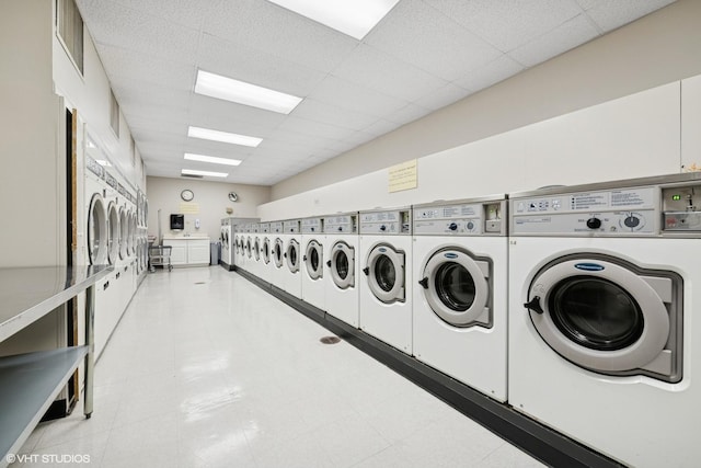 1460 N Sandburg Ter Unit 2608A, Chicago, IL 60610 - community laundry room featuring mail area, visible vents, and washer and clothes dryer