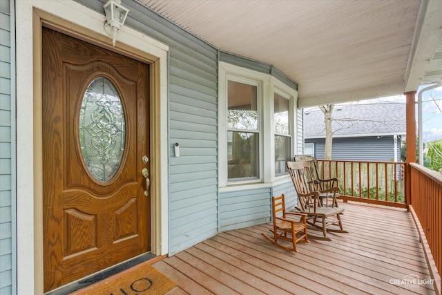 entrance to property with covered porch