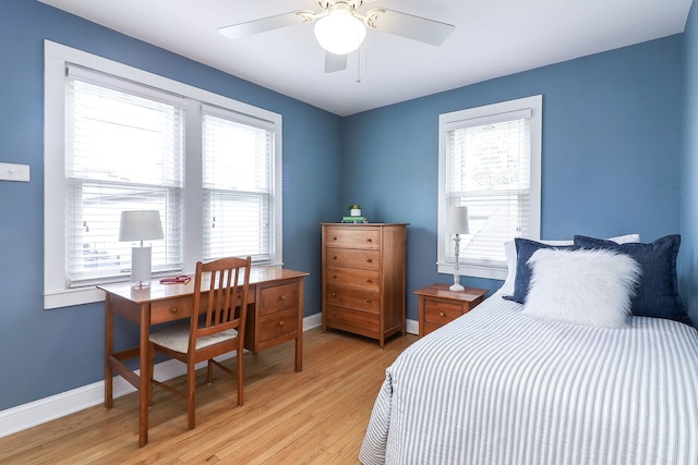 845 Smith St, Glen Ellyn, IL 60137 - bedroom with light wood-style flooring, multiple windows, and baseboards