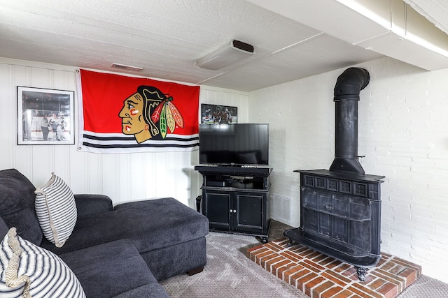 845 Smith St, Glen Ellyn, IL 60137 - carpeted living area featuring a wood stove