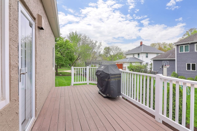 845 Smith St, Glen Ellyn, IL 60137 - wooden deck with a grill, a residential view, and a lawn