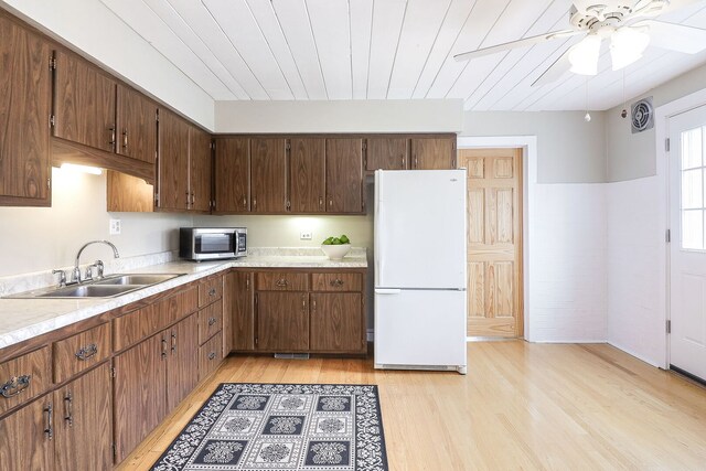 845 Smith St, Glen Ellyn, IL 60137 - kitchen with freestanding refrigerator, stainless steel microwave, a sink, light wood-type flooring, and wood ceiling