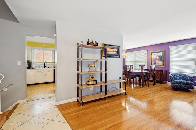 9336 Lavergne Ave, Skokie, IL 60077 - living area featuring plenty of natural light, baseboards, and light tile patterned floors