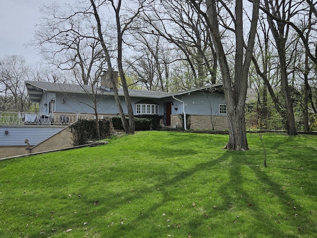 3569 Old Mill Rd, Highland Park, IL 60035 - exterior space featuring a chimney and a yard