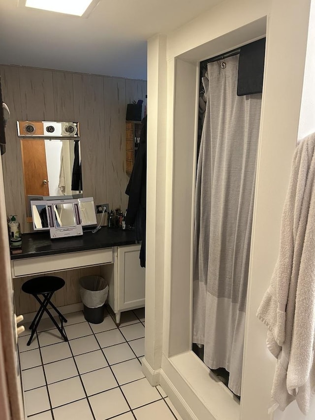 1828 N 21st Ave, Melrose Park, IL 60160 - full bath featuring wooden walls, tile patterned floors, and curtained shower