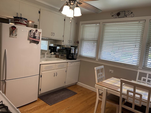 1828 N 21st Ave, Melrose Park, IL 60160 - kitchen with ceiling fan, a sink, light countertops, light wood finished floors, and white appliances