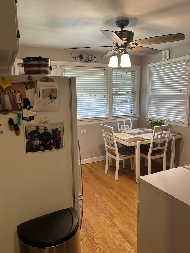 1828 N 21st Ave, Melrose Park, IL 60160 - dining space featuring light wood-style flooring and ceiling fan