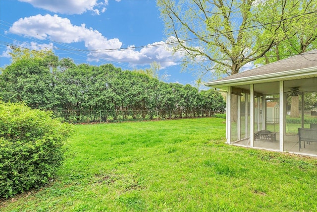 307 Dodson Dr W, Urbana, IL 61802 - view of yard with a sunroom and fence