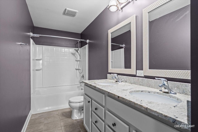 bathroom with a sink, baseboards, toilet, and visible vents