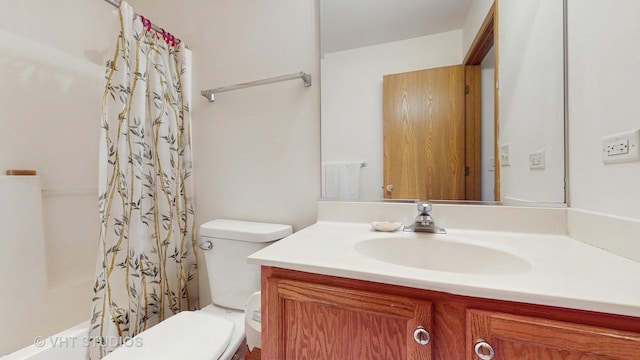 full bath with toilet, vanity, and shower / tub combo with curtain