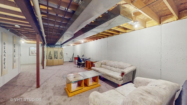 unfinished below grade area featuring carpet