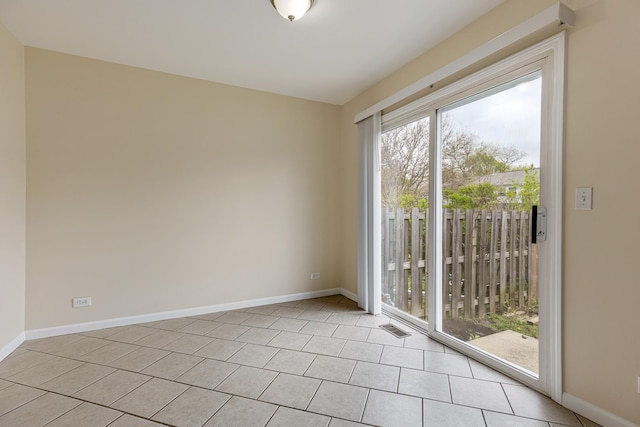 907 Banbury Ct, Schaumburg, IL 60194 - unfurnished room with visible vents, baseboards, and light tile patterned flooring