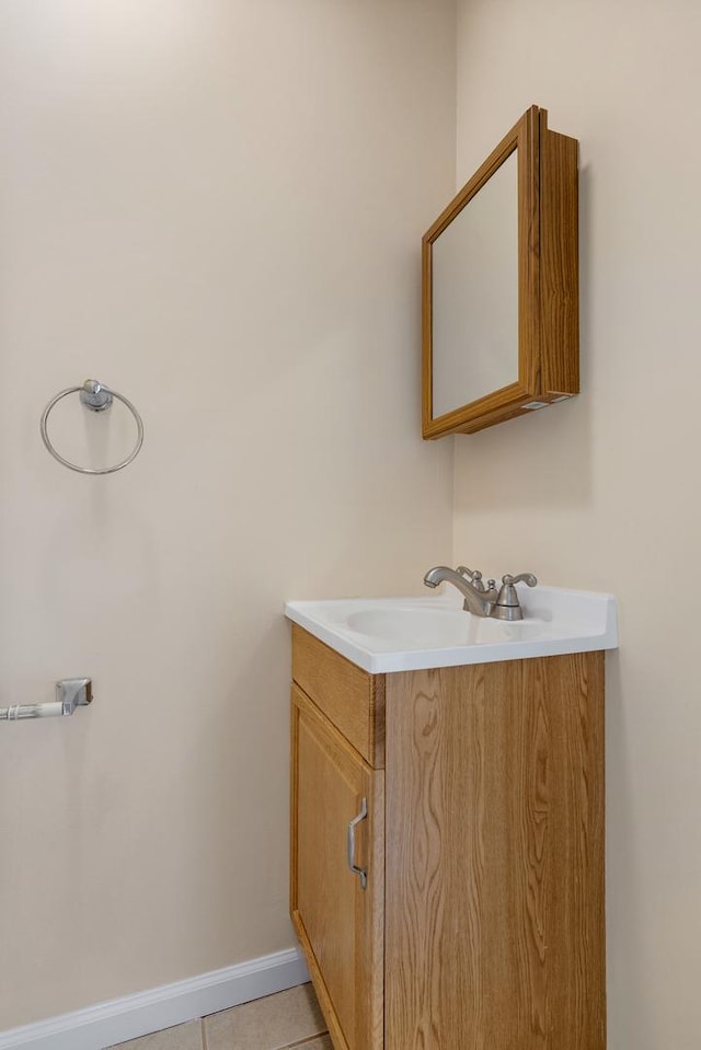 907 Banbury Ct, Schaumburg, IL 60194 - bathroom featuring vanity, baseboards, and tile patterned flooring