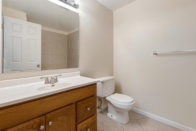 907 Banbury Ct, Schaumburg, IL 60194 - bathroom with toilet, baseboards, tile patterned flooring, and vanity
