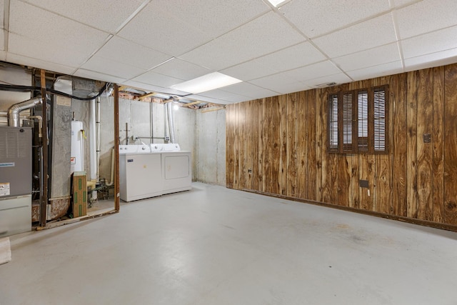 907 Banbury Ct, Schaumburg, IL 60194 - basement featuring a drop ceiling, independent washer and dryer, visible vents, gas water heater, and wooden walls