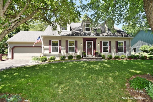 5N850 Ravine Dr, Saint Charles, IL 60175 - cape cod house featuring driveway, a front lawn, an attached garage, and a shingled roof