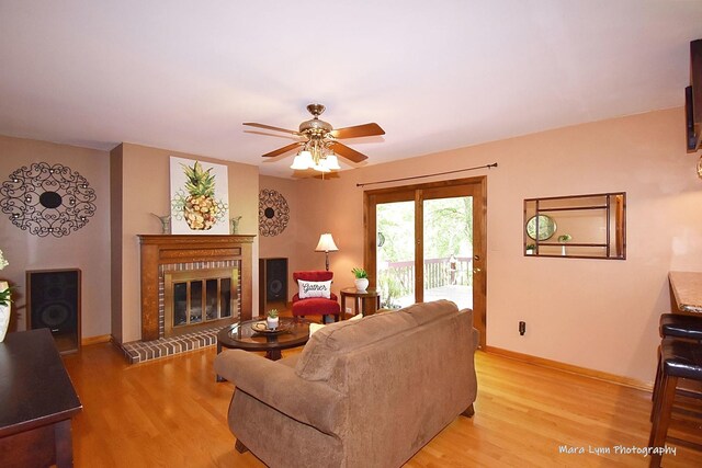 5N850 Ravine Dr, Saint Charles, IL 60175 - living area featuring light wood finished floors, baseboards, and a fireplace