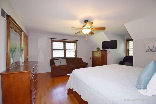 5N850 Ravine Dr, Saint Charles, IL 60175 - bedroom featuring light wood-style floors, multiple windows, a ceiling fan, and baseboards