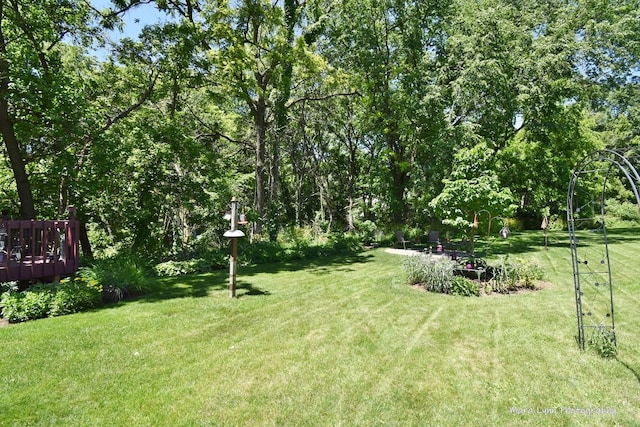 5N850 Ravine Dr, Saint Charles, IL 60175 - view of green lawn featuring a wooden deck