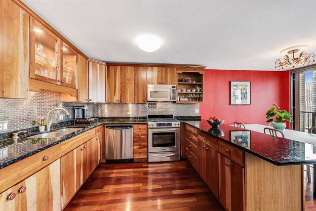 400 E Randolph St Unit 3018, Chicago, IL 60601 - kitchen with appliances with stainless steel finishes, a peninsula, dark wood-style floors, open shelves, and tasteful backsplash