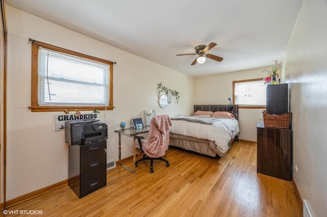 545 Morris Ave, Bellwood, IL 60104 - bedroom featuring light wood-type flooring, baseboards, and ceiling fan
