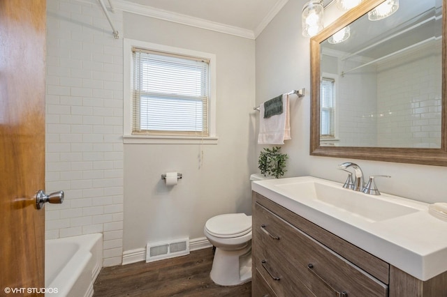 545 Morris Ave, Bellwood, IL 60104 - bathroom with ornamental molding, wood finished floors, toilet, baseboards, and vanity