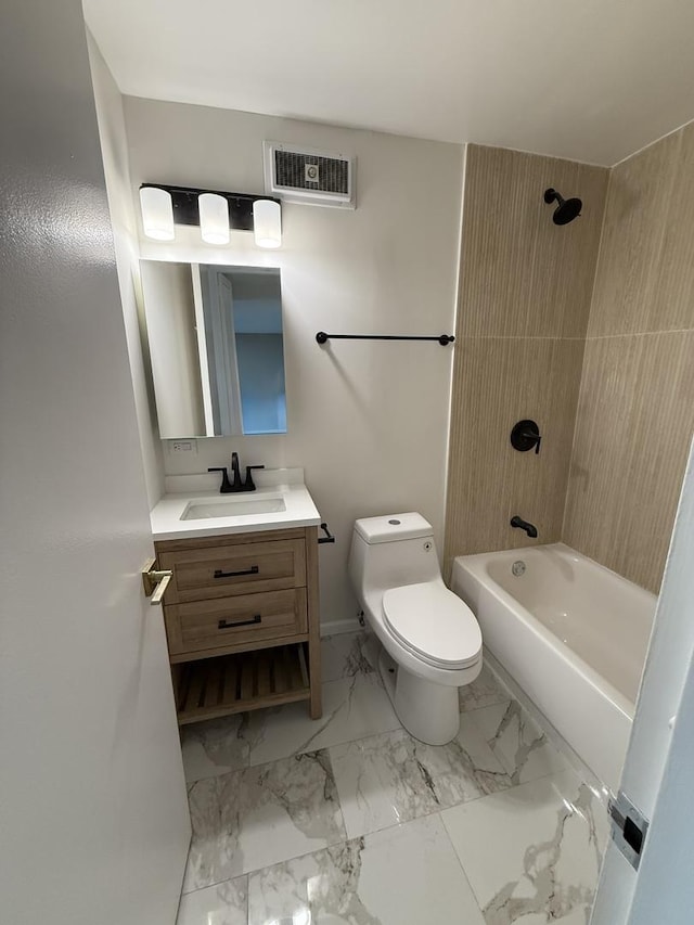 bathroom with marble look tiles, vanity, toilet, bathtub / shower combination, and baseboards