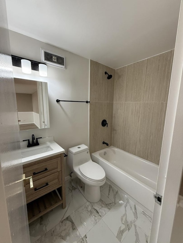 full bathroom with toilet, marble finish floors, vanity, and shower / tub combination