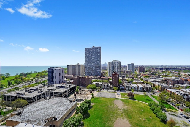 view of urban area with a large body of water