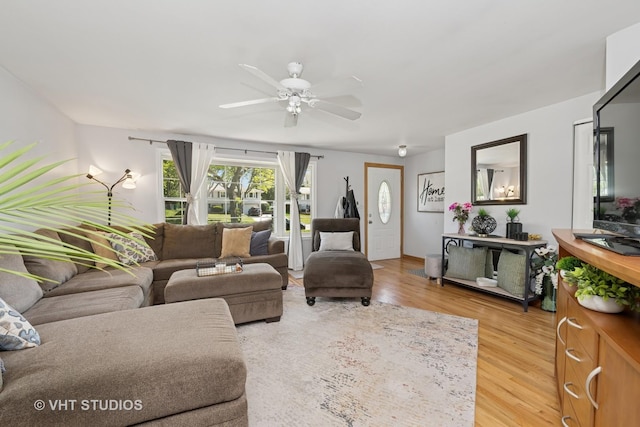 1008 W Weathersfield Way, Schaumburg, IL 60193 - living room with light wood-style flooring and a ceiling fan