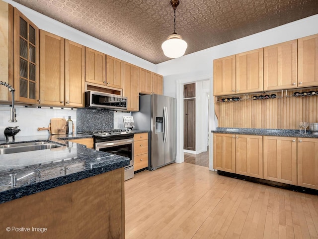213 S Ashland Ave, La Grange, IL 60525 - kitchen featuring stainless steel appliances, a sink, an ornate ceiling, light wood-style flooring, and decorative backsplash