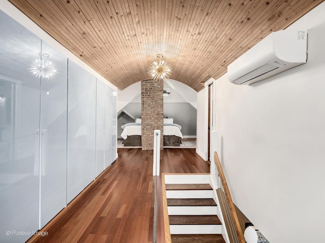 213 S Ashland Ave, La Grange, IL 60525 - bonus room featuring a wall mounted AC, vaulted ceiling, and wood finished floors