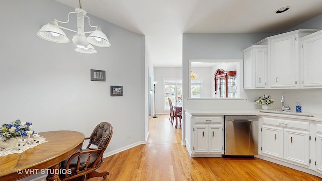23118 Lacroix Ln, Plainfield, IL 60544 - kitchen with dishwasher, a chandelier, light countertops, and white cabinets