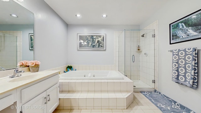 23118 Lacroix Ln, Plainfield, IL 60544 - full bathroom featuring vanity, a garden tub, a shower stall, tile patterned floors, and recessed lighting