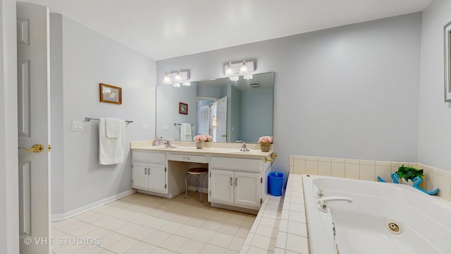 23118 Lacroix Ln, Plainfield, IL 60544 - bathroom with double vanity, a jetted tub, and tile patterned flooring