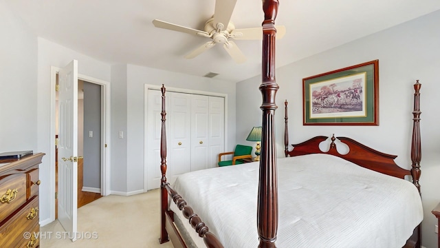 23118 Lacroix Ln, Plainfield, IL 60544 - bedroom featuring a closet, light colored carpet, and ceiling fan